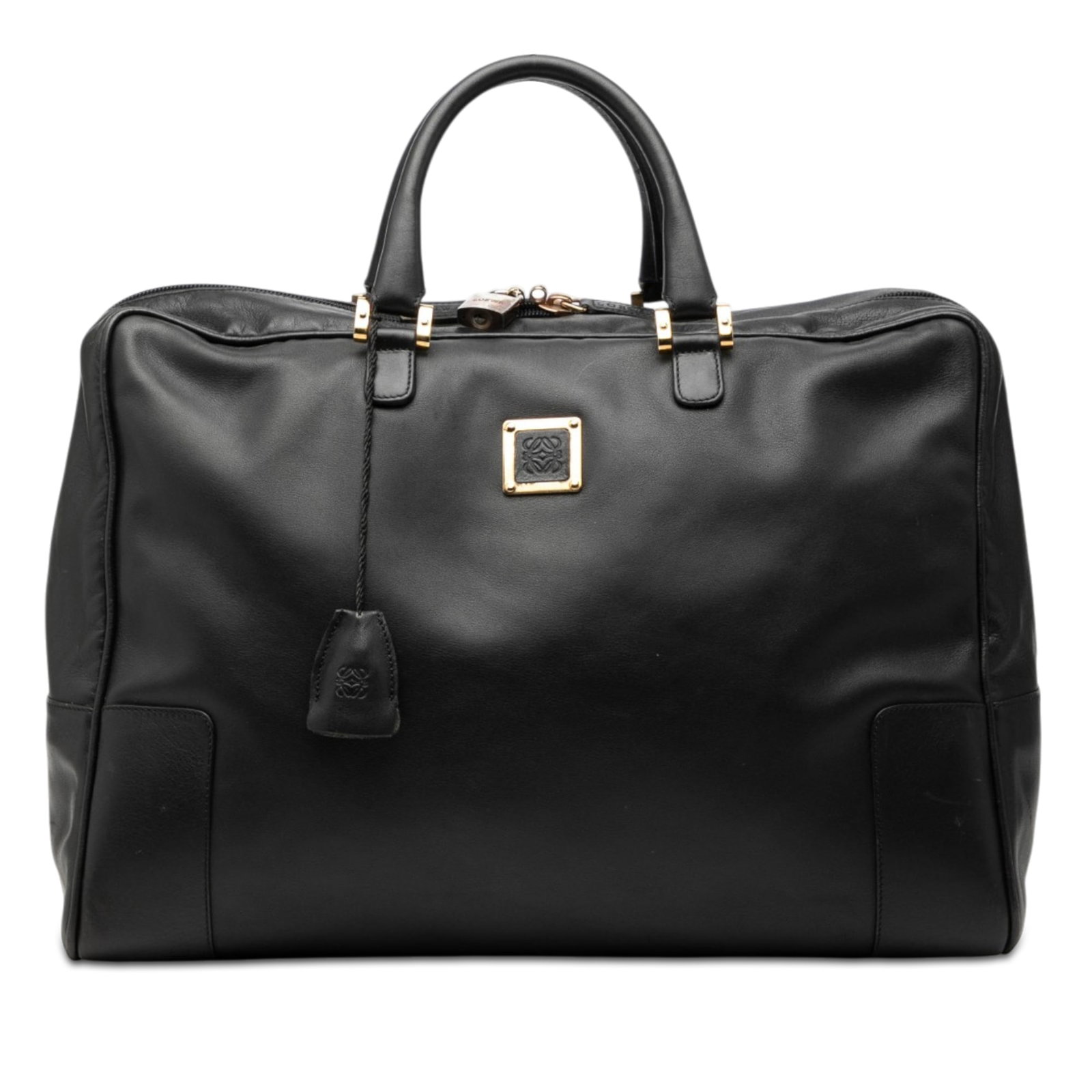 LOEWE Amazona 40 Black Leather Handbag: LOEWE Amazona 40 Black Leather Handbag The LOEWE Amazona 40 is a black leather handbag with rolled leather handles, a top zip closure, and an interior zip pocket. Made in Spain, this piece shows visib