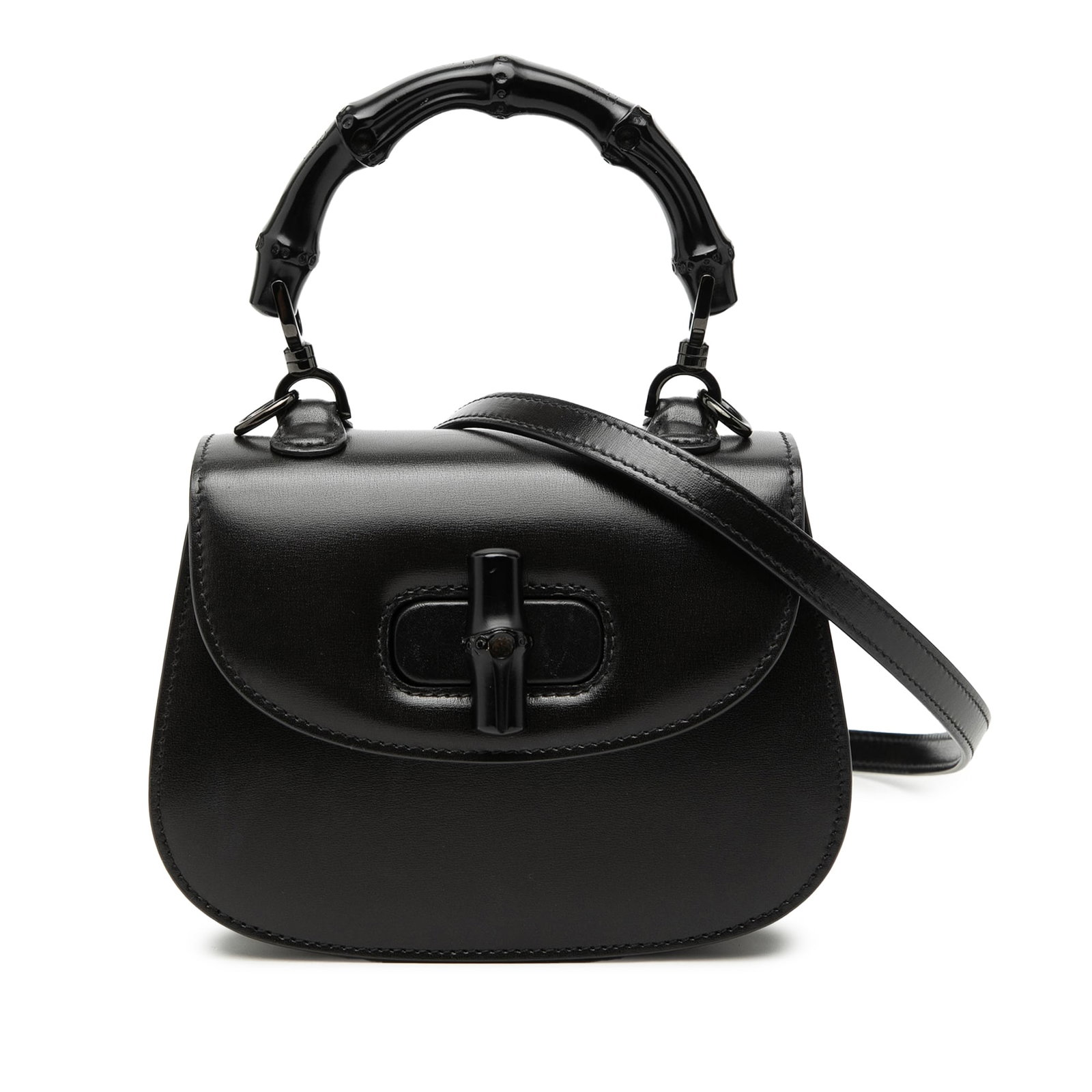 Gucci 1947 Bamboo Mini Black Calfskin Satchel: Gucci 1947 Bamboo Mini Black Calfskin Satchel This Gucci Mini Calfskin 1947 Bamboo Top Handle Bag features a black leather body accented with a bamboo top handle. It includes an adjustable and detacha