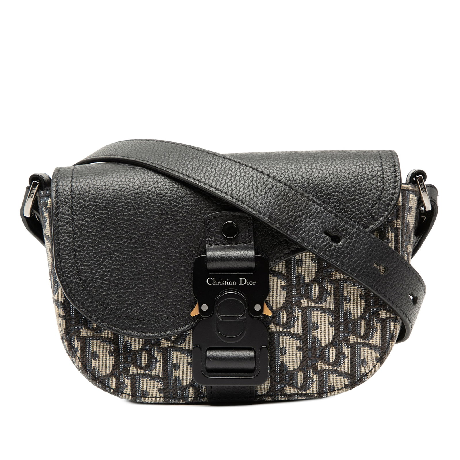 Mini Saddle Messenger Bag with Oblique Canvas and Buckle by Dior: Mini Saddle Messenger Bag with Oblique Canvas and Buckle by Dior This Dior Mini Oblique Canvas Saddle Buckle Messenger Bag features a canvas body with leather trim, an adjustable flat strap, a flap wi