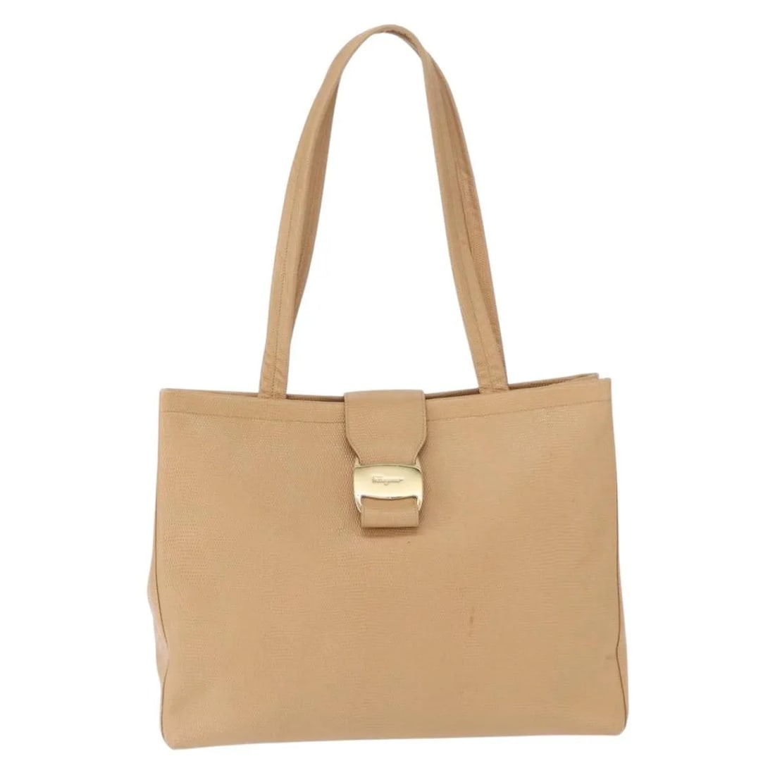 Beige Leather Vala Tote by Salvatore Ferragamo Italy: Beige Leather Vala Tote by Salvatore Ferragamo Italy This Salvatore Ferragamo Vala tote is crafted from beige leather and designed for women. Made in Italy, it features a spacious interior and sturdy 