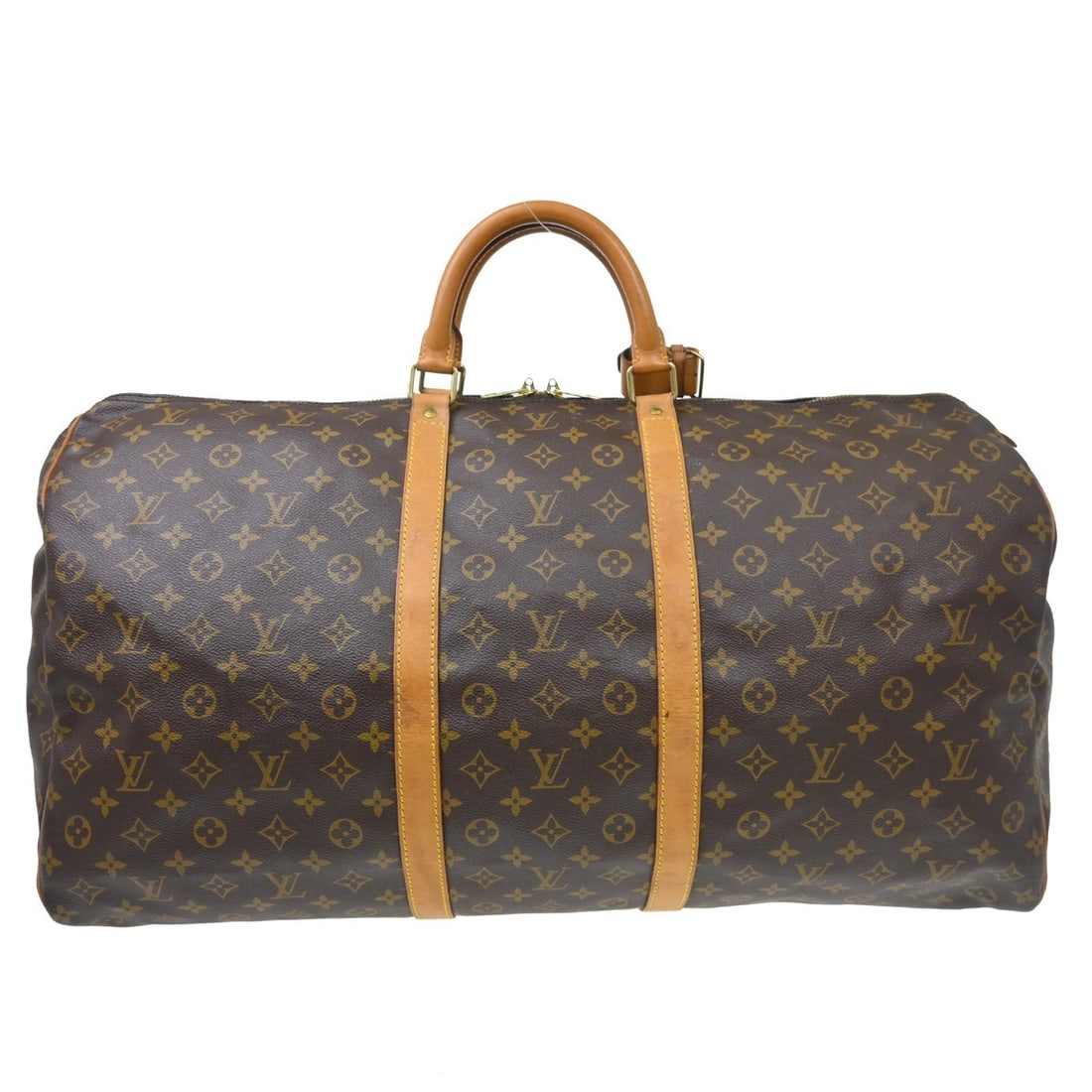 Louis Vuitton Keepall 60 Monogram Canvas Duffle Bag M41422: Louis Vuitton Keepall 60 Monogram Canvas Duffle Bag M41422 Vintage Louis Vuitton Keepall 60 travel handbag in brown Monogram canvas with leather trim and double handles. This extra-large duffle-style 