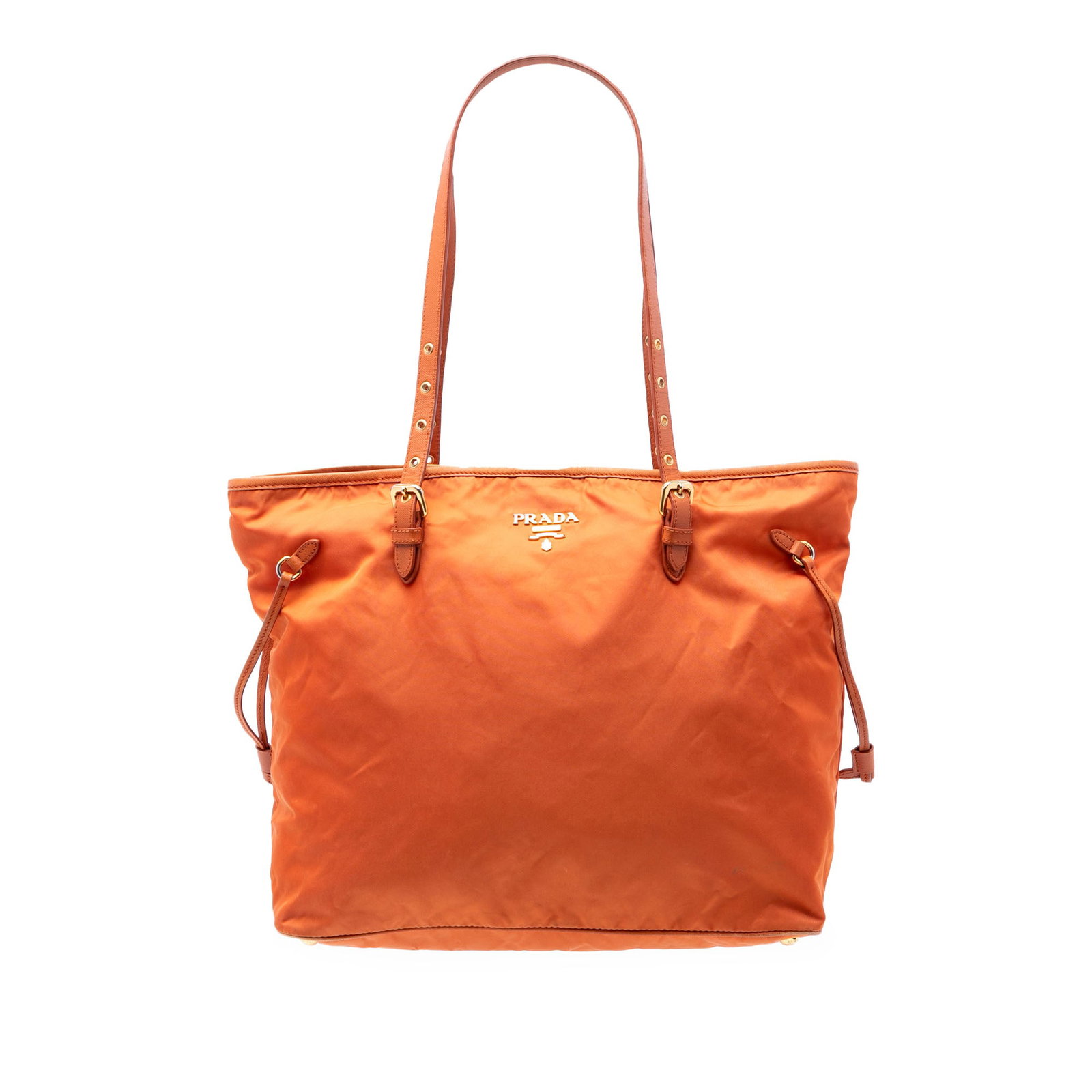 Prada Orange Nylon Tote Saffiano Trimmed Tessuto: Prada Orange Nylon Tote Saffiano Trimmed Tessuto This Prada Saffiano Trimmed Tessuto Tote features a durable nylon body accented with leather trim and flat leather handles. The bag has an open top wit