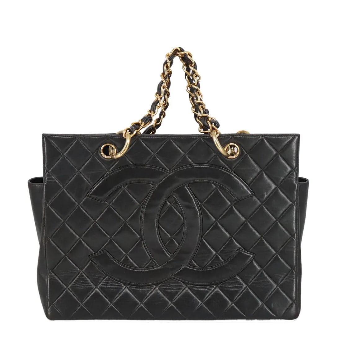 Chanel Vintage Grand Shopping Tote Black Leather Handbag: Chanel Vintage Grand Shopping Tote Black Leather Handbag Vintage Grand Shopping Tote in black quilted lambskin. This Chanel tote is made in France and shows fair overall condition with visible signs o