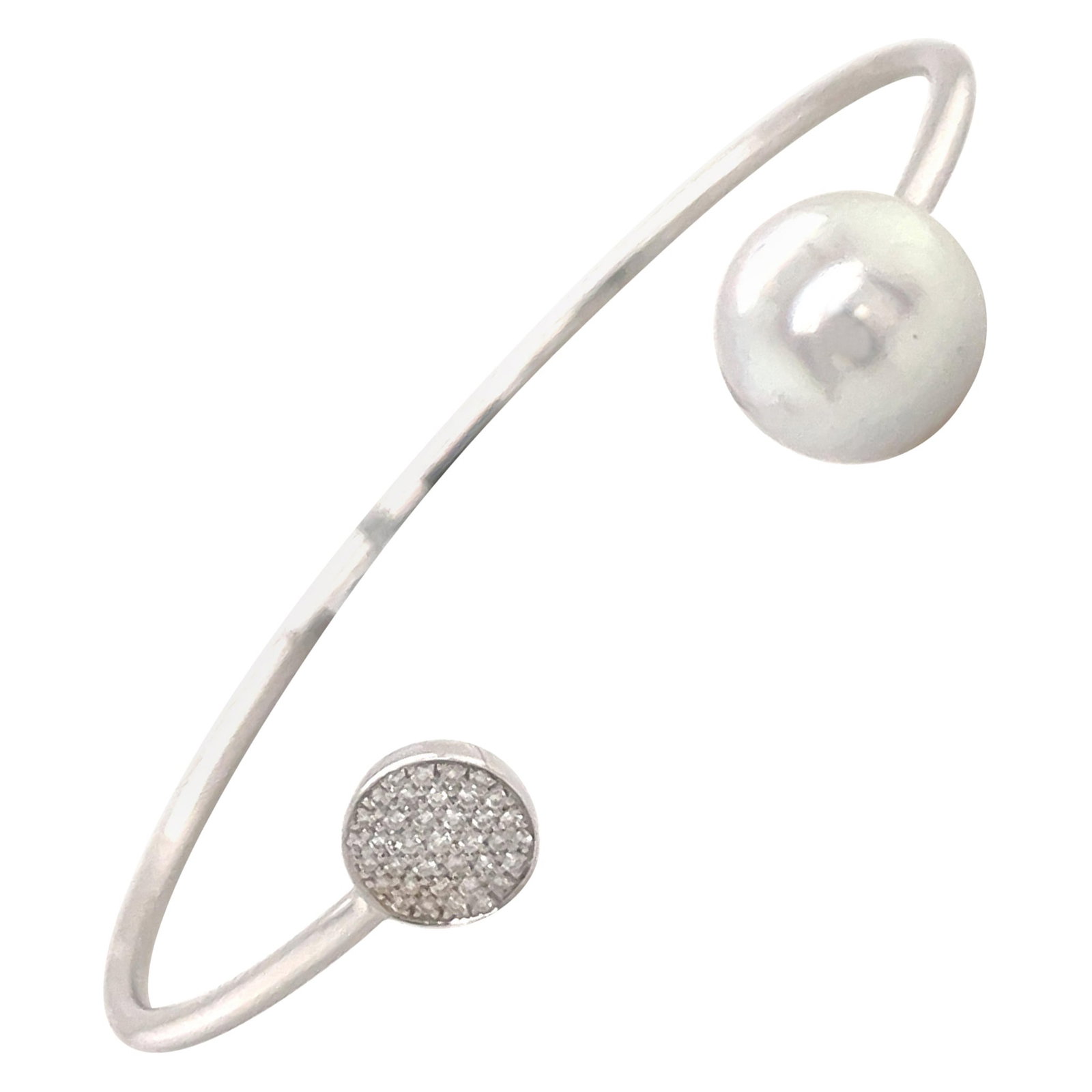 Harbor Diamonds 18K White Gold Bangle with South Sea Pearl and Diamonds: Harbor Diamonds 18K White Gold Bangle with South Sea Pearl and Diamonds This exquisite 18 Karat White Gold bangle bracelet is a contemporary piece, crafted in the United States and manufactured in 202