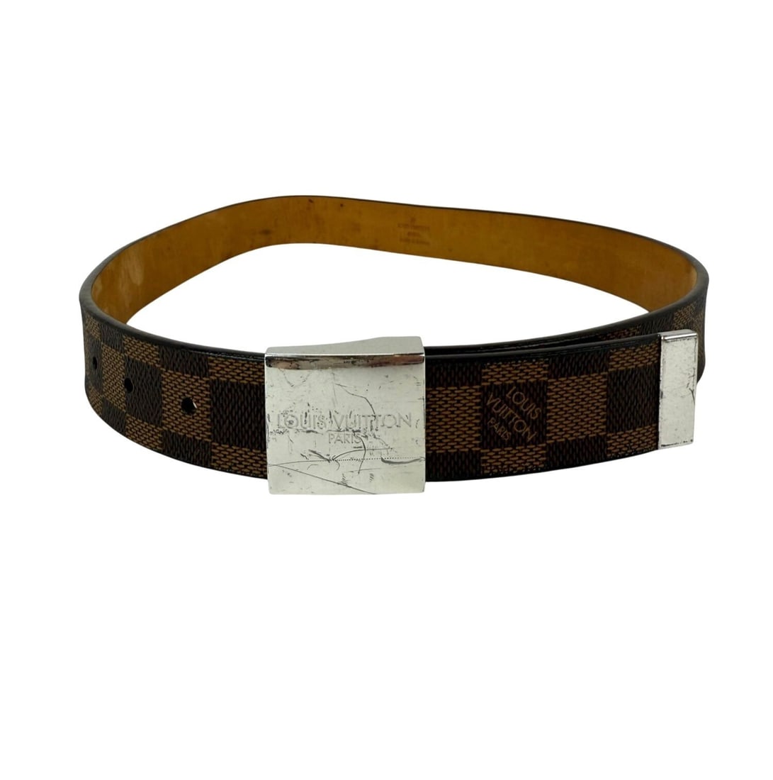 Leather Dress Belt in Brown Damier Ebene by Louis Vuitton Size 75 30MM: Leather Dress Belt in Brown Damier Ebene by Louis Vuitton Size 75 30MM This Louis Vuitton LV Inventeur men's belt features the signature Damier Ebene pattern in brown leather, accented with a logo buc