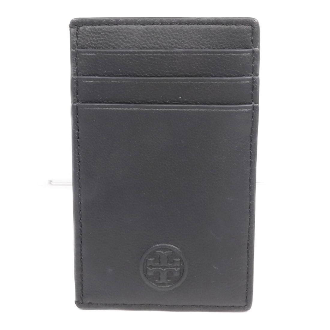 Tory Burch Lambskin Card Case Black Womens: Tory Burch Lambskin Card Case Black Womens A Tory Burch card case in black lambskin (sheep leather), designed in a regular women's size. It features one open pocket and three card slots. Condition is 