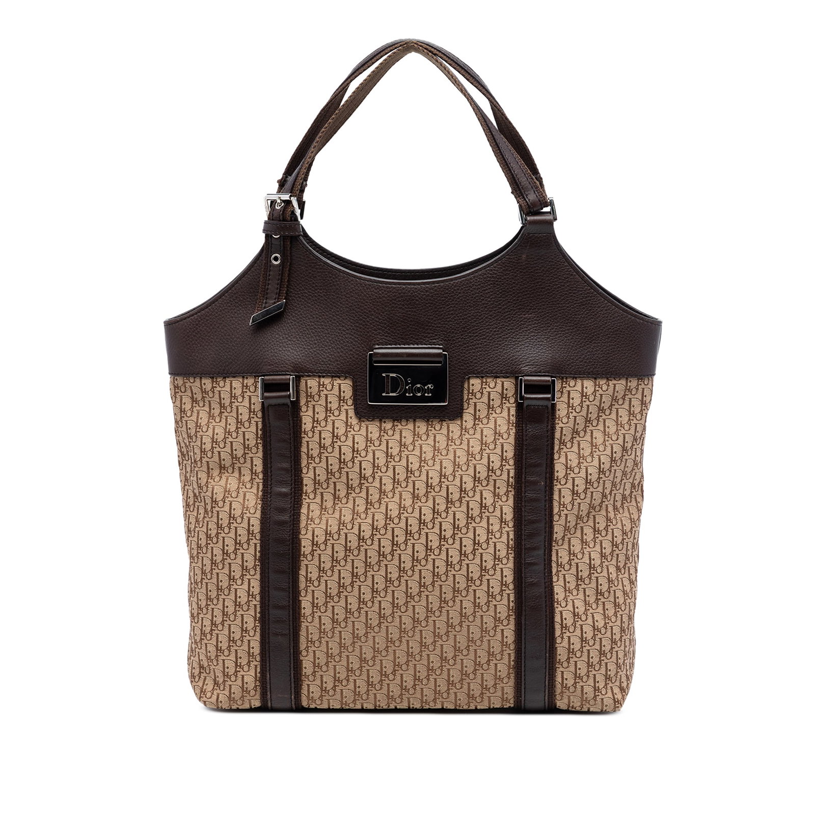 Dior Street Chic Tote in Diorissimo Trotter Canvas: Dior Street Chic Tote in Diorissimo Trotter Canvas This Diorissimo Trotter Canvas Street Chic Tote features a canvas body with leather trim, flat leather handles, an open top with magnetic snap closur