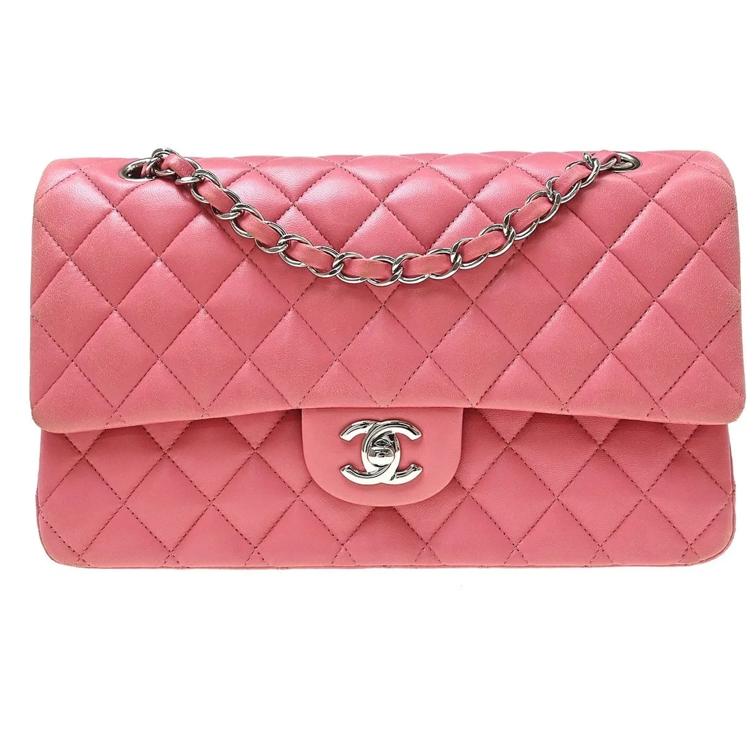 Chanel Timeless Classic Double Flap Pink Leather Handbag: Chanel Timeless Classic Double Flap Pink Leather Handbag A Chanel Timeless Classic Double Flap handbag in pink leather with a quilted lambskin exterior. Designed for women, it measures 25 cm x 16 cm x