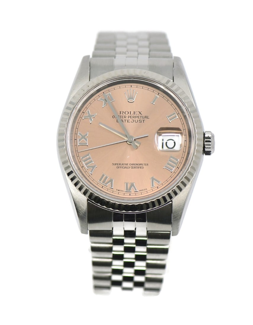 Rolex 16234 Datejust 36mm stainless steel wristwatch pink dial: Rolex 16234 Datejust 36mm stainless steel wristwatch pink dial Pre-owned Rolex Datejust wristwatch in stainless steel with a silver fluted bezel, pink dial, and analog display. It features a 36 mm rou
