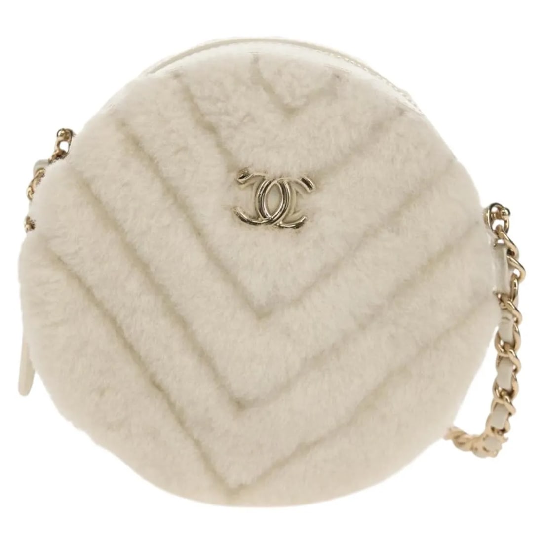 Chanel Round Clutch with Chain White Faux Fur Bag: Chanel Round Clutch with Chain White Faux Fur Bag Round clutch with chain in a chevron shearling style, presented in white faux fur. It measures 12 cm x 12 cm x 5 cm and was made in France. The item i