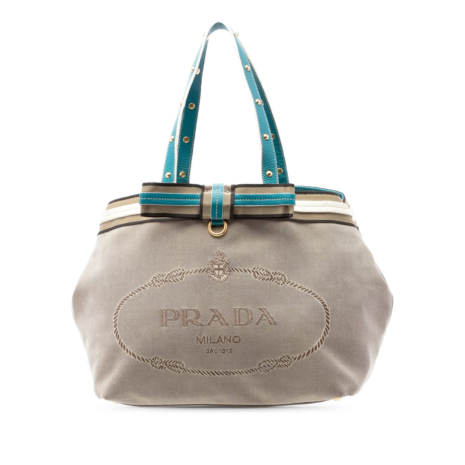 Prada Canapa Logo Tote Brown Canvas Handbag: Prada Canapa Logo Tote Brown Canvas Handbag Prada Canvas Canapa Logo Tote in brown fabric with studded flat leather straps, an open top with snap button closure, and an interior zip pocket. Made in It