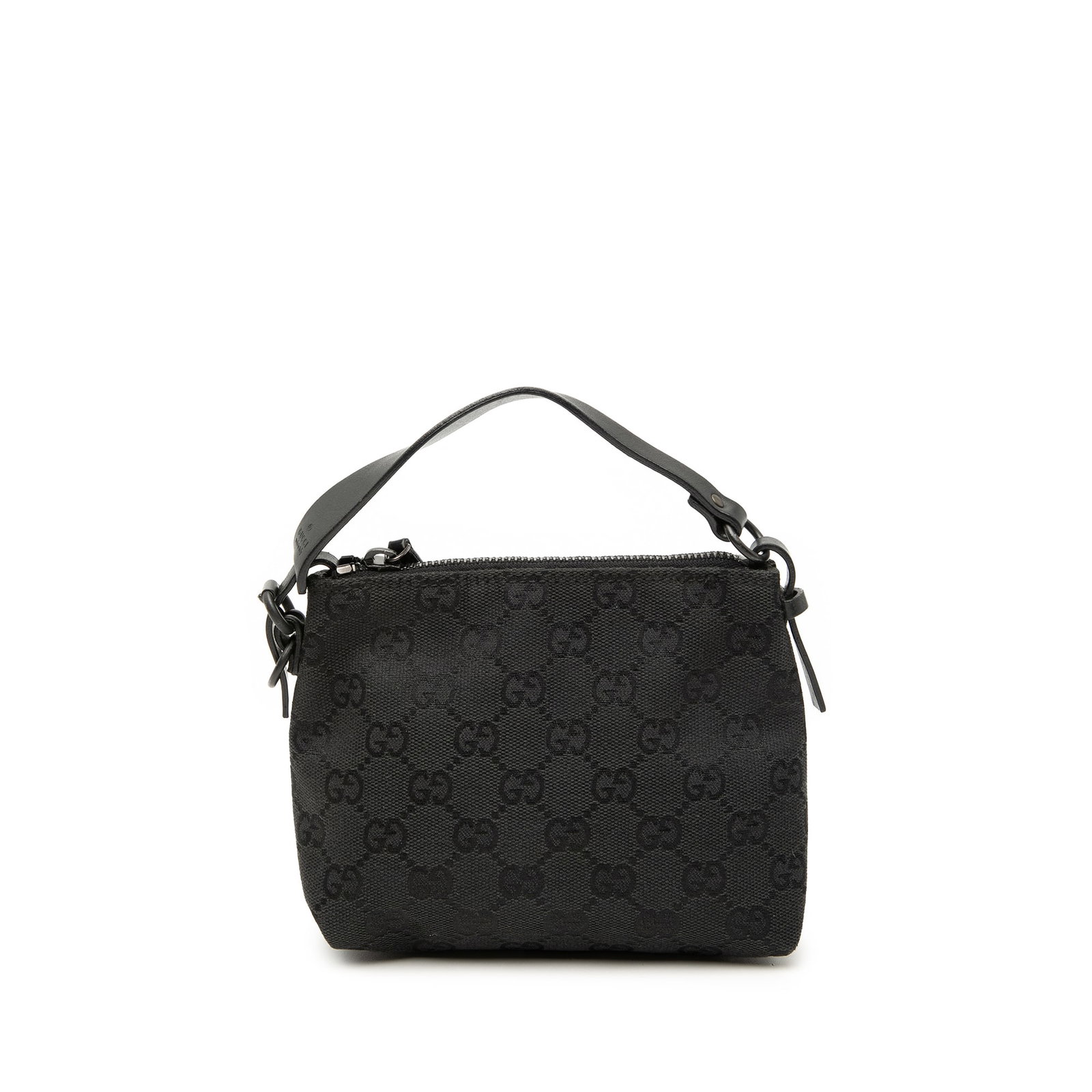 Gucci black canvas top zip handbag: Gucci black canvas top zip handbag This Gucci GG Canvas Handbag features a canvas body with a black finish, complemented by a flat leather strap and a top zip closure. The bag shows signs of wear on t