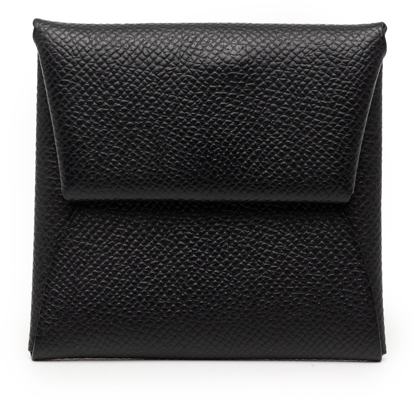 Black Epsom Leather Bastia Coin Pouch by Hermes: Black Epsom Leather Bastia Coin Pouch by Hermes This Bastia coin pouch is crafted from Epsom leather in Noir (black) and features a snap button closure. The exterior and interior display some staining