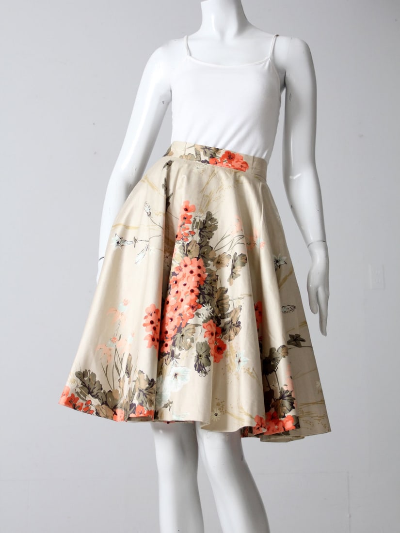 Satin Floral 1950s Circle Skirt by Casual Time of California with Sequins: Satin Floral 1950s Circle Skirt by Casual Time of California with Sequins This 1950s vintage circle skirt by Casual Time of California features luminous satin fabric adorned with a soft floral print i