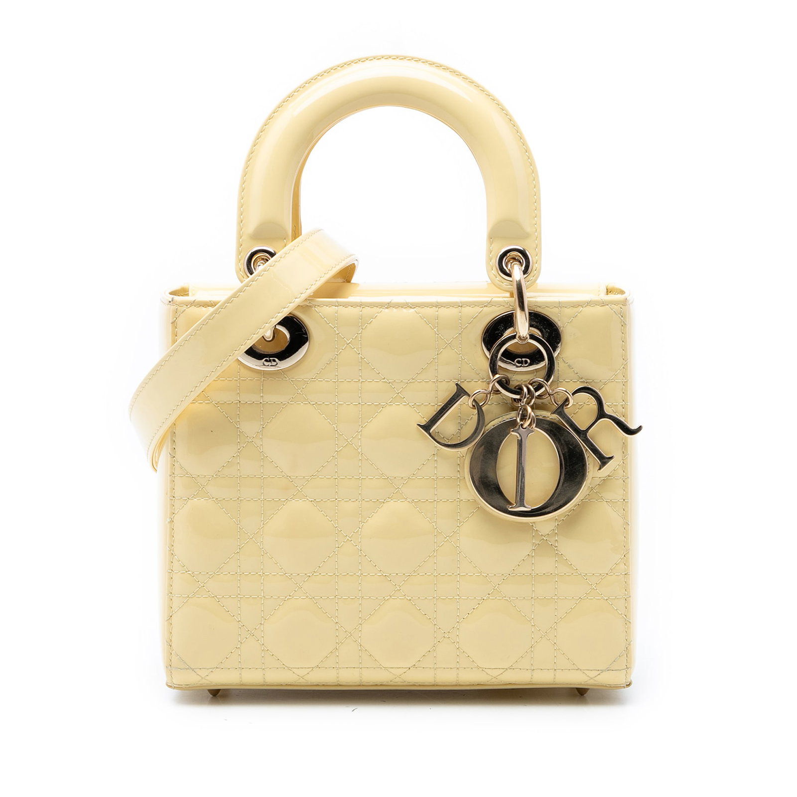 Dior Small Lady Dior Cannage Patent Leather Handbag Yellow: Dior Small Lady Dior Cannage Patent Leather Handbag Yellow The Small Patent Cannage Lady Dior is a yellow bag from Dior, made in Italy. It features a quilted patent leather body, flat top handles, a d