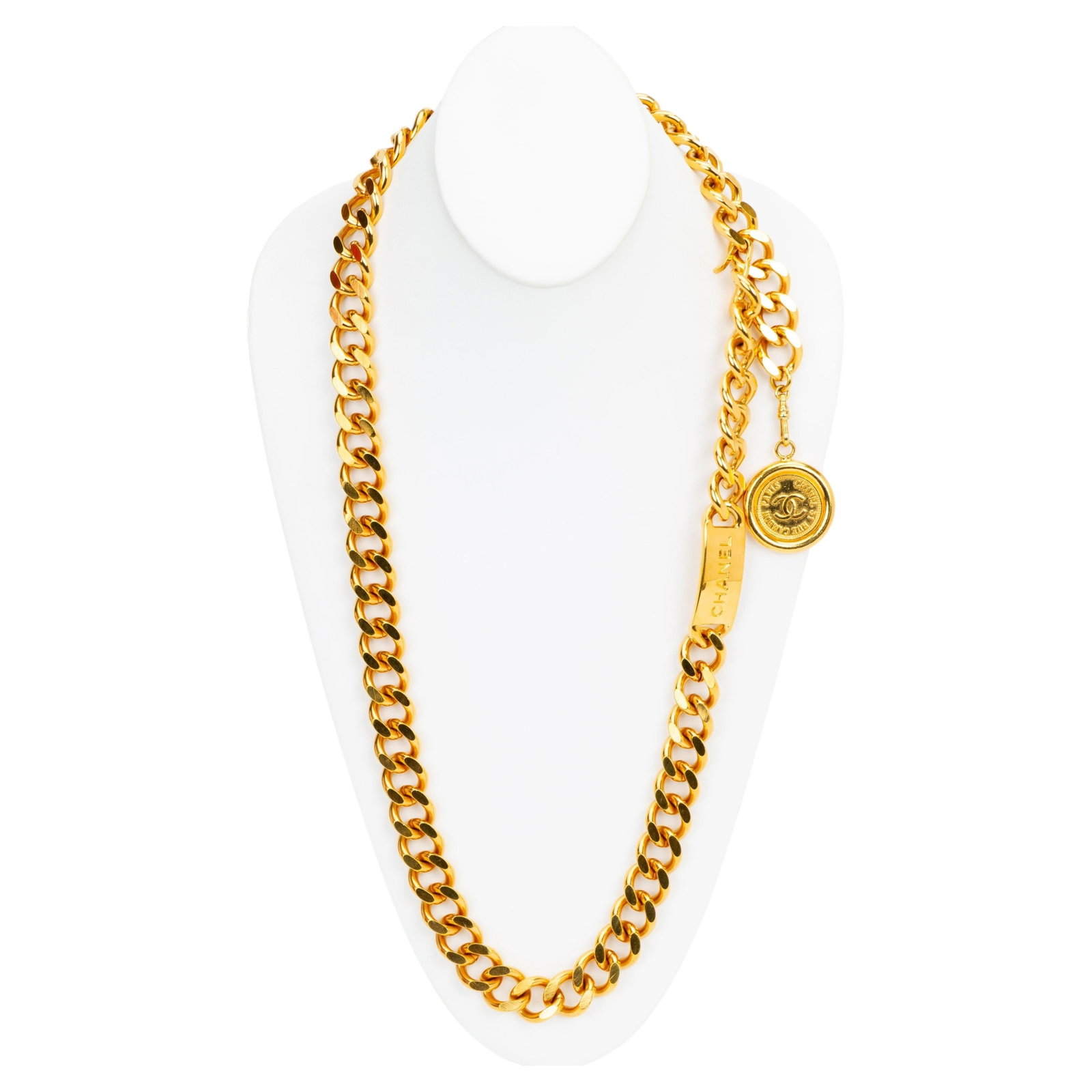 Gold Plated Chanel 1980s Coin Medallion Chain Belt or Necklace: Gold Plated Chanel 1980s Coin Medallion Chain Belt or Necklace This Chanel vintage gold coin belt or necklace features large links and a signature CC medallion coin charm. Crafted from gold plated met