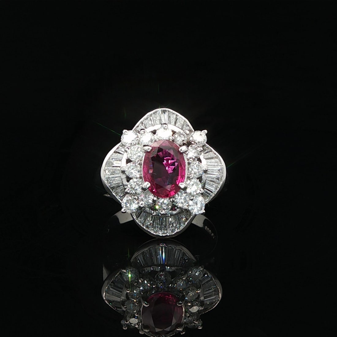 GIA Certified 2.04ct No Heat Oval Red Ruby Diamond Platinum Ring: GIA Certified 2.04ct No Heat Oval Red Ruby Diamond Platinum Ring This exquisite cocktail ring showcases a stunning natural oval-cut ruby, measuring 2.04 carats, which has been certified by GIA. The vi