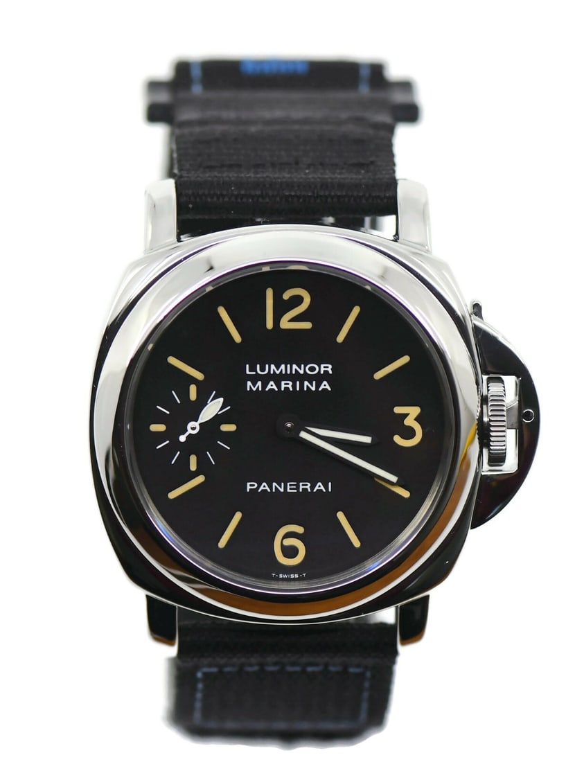 Panerai Luminor Marina PAM00001 Stainless Steel 44mm Watch with Box and Papers: Panerai Luminor Marina PAM00001 Stainless Steel 44mm Watch with Box and Papers Discover the timeless elegance of the Panerai Luminor Marina Stainless Steel Watch PAM00001. This exquisite wristwatch fe