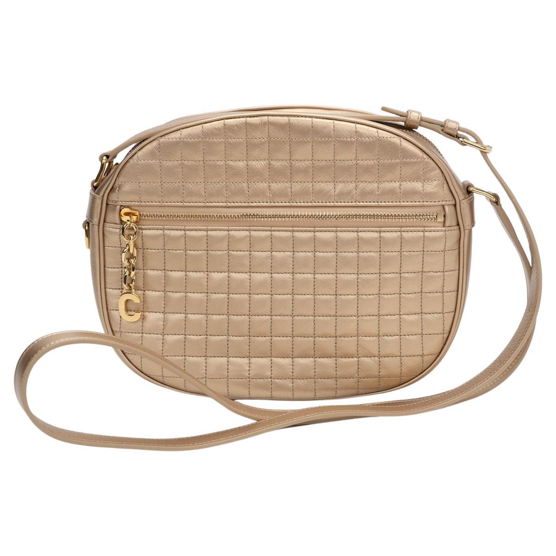 Celine Laminated Gold Quilted Crossbody Bag with C Charm: Celine Laminated Gold Quilted Crossbody Bag with C Charm This exquisite Celine cross body bag features a luxurious laminated gold quilted calfskin exterior, showcasing a stunning C charm in gold metal