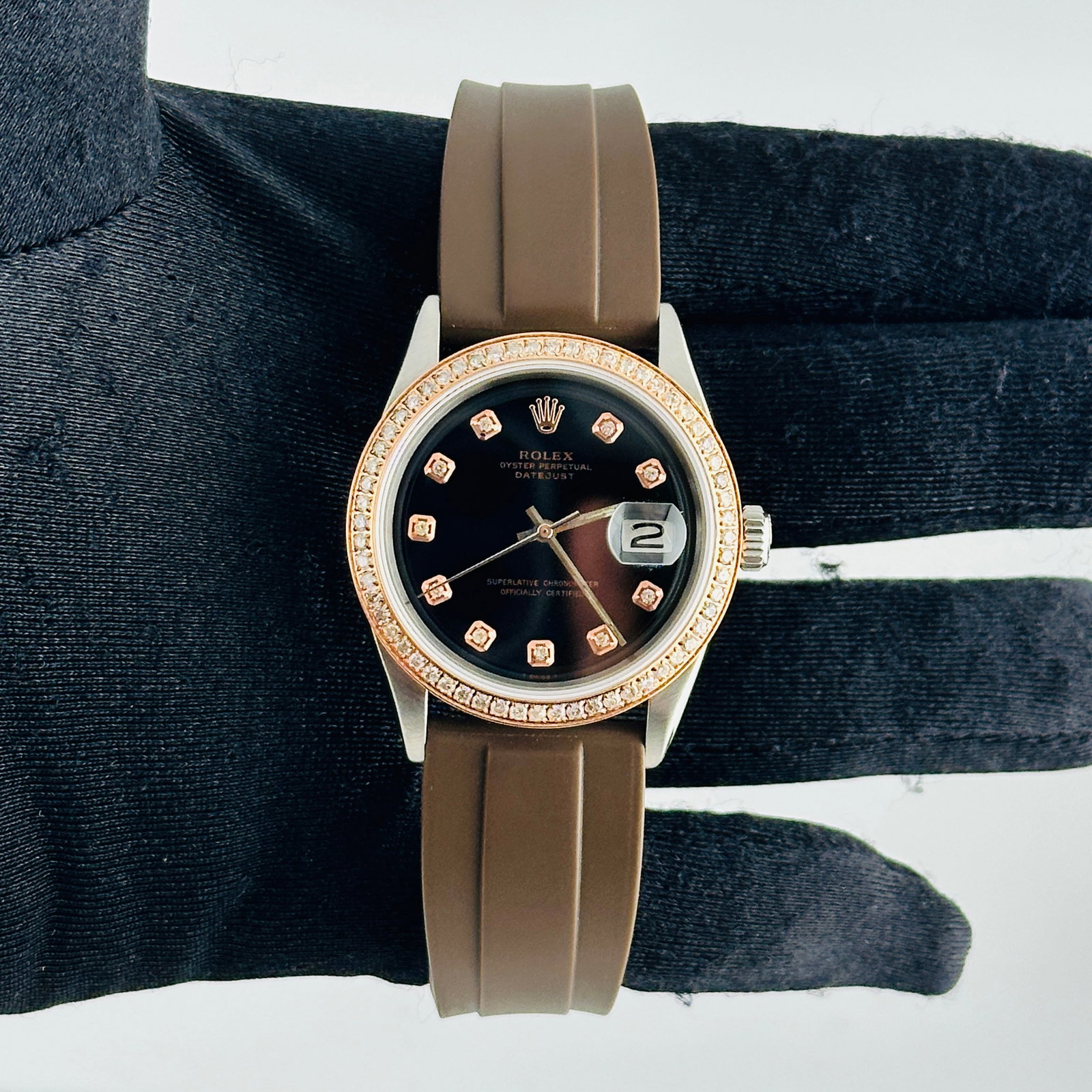 Rolex Datejust Ref 1601 Mens Watch Black Rose Diamond Dial Rubber Strap Aftermarket: Rolex Datejust Ref 1601 Mens Watch Black Rose Diamond Dial Rubber Strap Aftermarket This Rolex Datejust features an aftermarket black and rose diamond dial, complemented by a pave plated diamond bezel