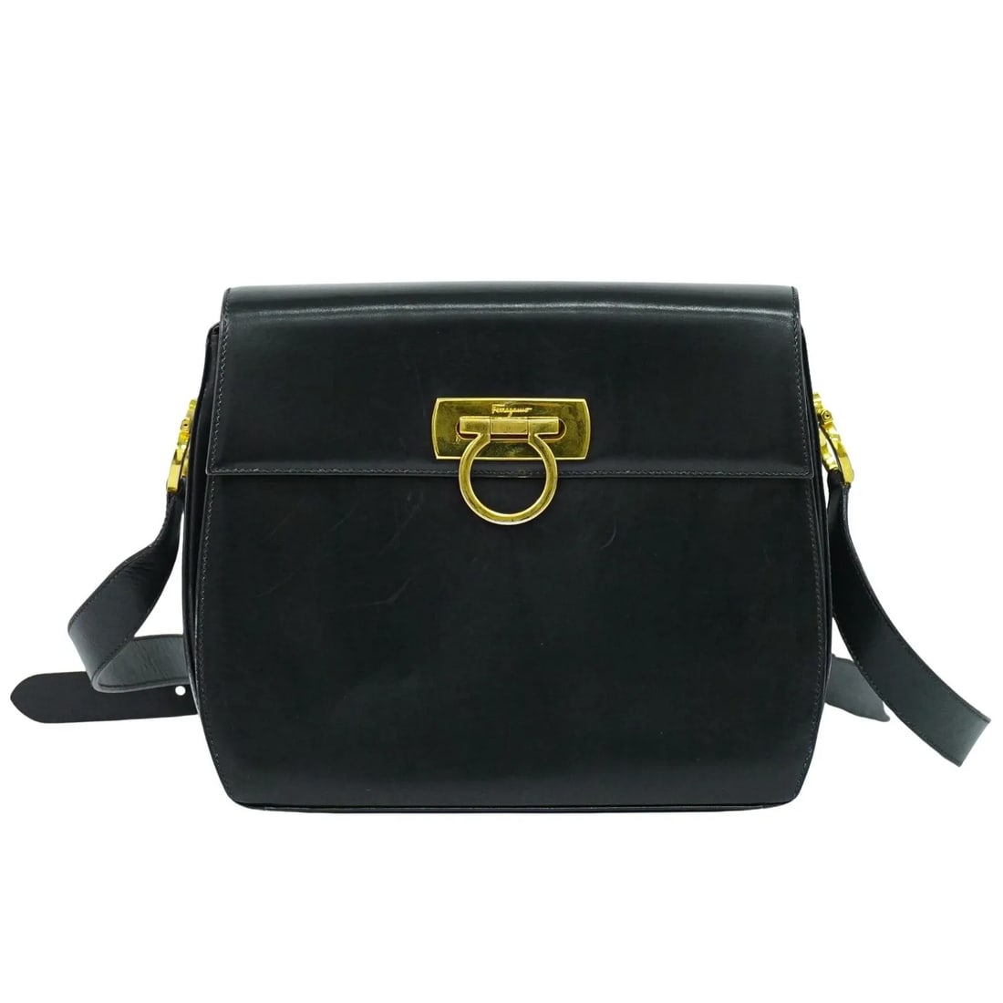 Black Leather Shoulder Bag Salvatore Ferragamo Gancini: Black Leather Shoulder Bag Salvatore Ferragamo Gancini This Salvatore Ferragamo Gancini shoulder bag is crafted from black leather and designed for women. It features the classic Gancini motif, with a