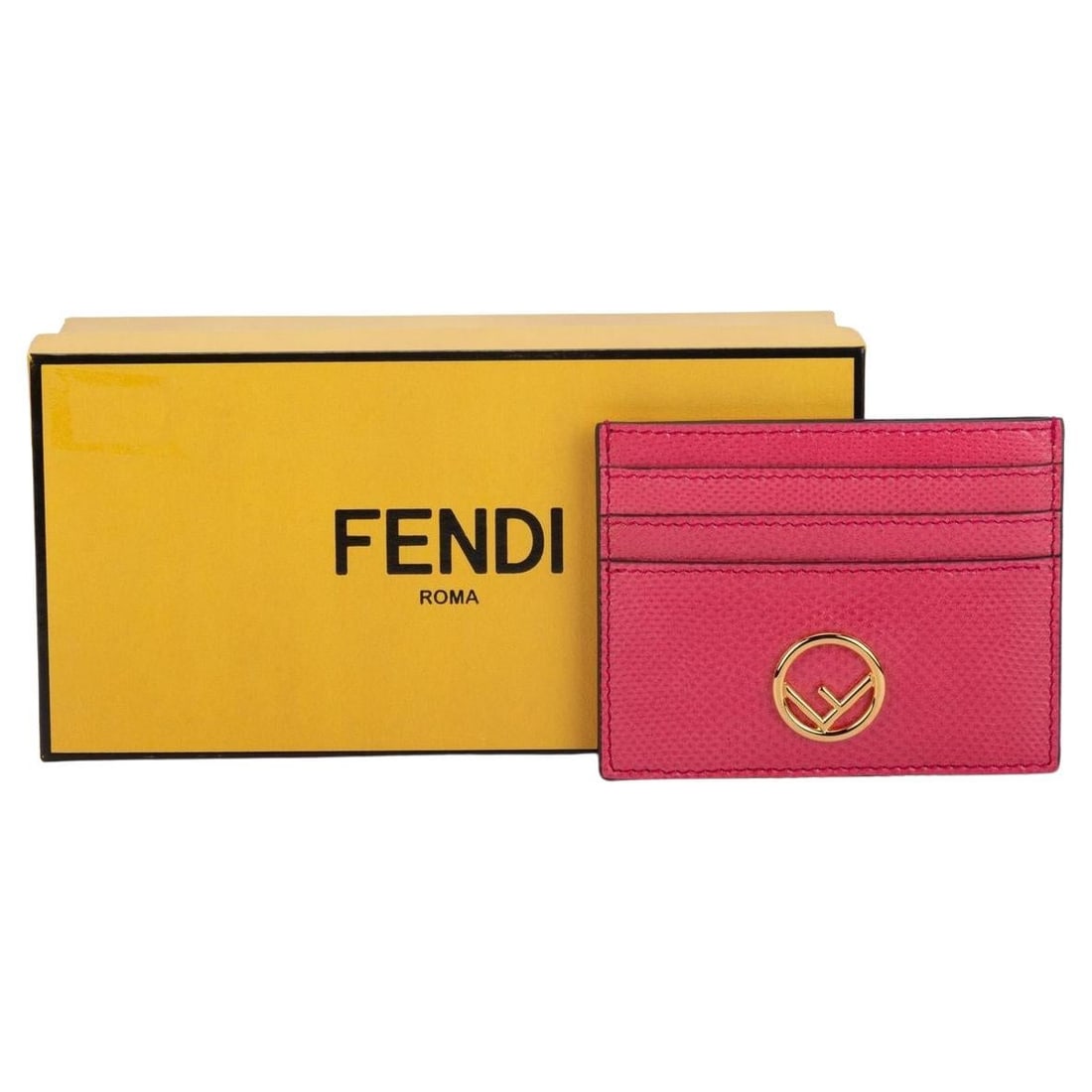 Fendi Pink Leather Card Holder with Golden F Logo: Fendi Pink Leather Card Holder with Golden F Logo Elevate your accessory collection with this stunning Fendi card holder in a chic pink hue. Expertly crafted from high-quality leather, this luxurious 