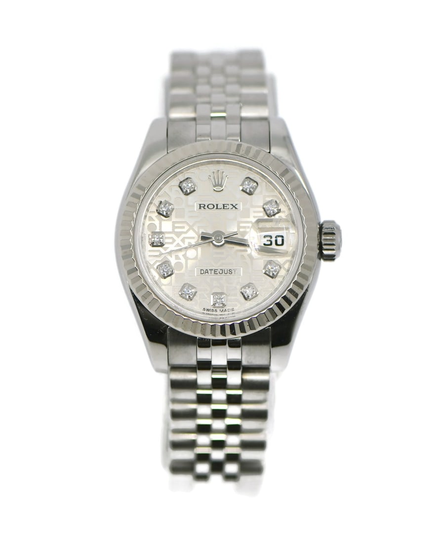 Rolex Datejust 179174 Womens 26 mm Steel Diamond Bezel Watch: Rolex Datejust 179174 Womens 26 mm Steel Diamond Bezel Watch Pre-owned Rolex Datejust wristwatch with a mechanical automatic movement and a classic round case. This women's watch features a silver dia