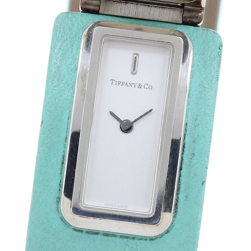 Tiffany T Bangle Ladies Quartz Wristwatch SV925 Silver Dial: Tiffany T Bangle Ladies Quartz Wristwatch SV925 Silver Dial This Tiffany & Co. T Bangle women's wristwatch features a sterling silver (SV925) case paired with a leather strap. The watch is powered by 