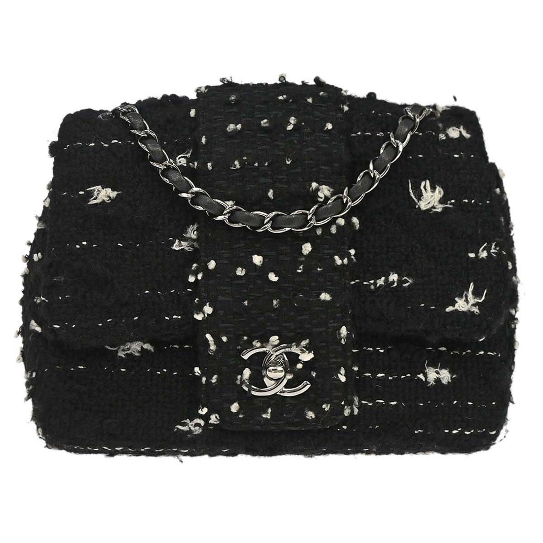 CHANEL Elementary Chic small black tweed flap shoulder bag: CHANEL Elementary Chic small black tweed flap shoulder bag Chanel Elementary Chic flap shoulder bag in black tweed with matelasse pattern and chain shoulder strap. This small shoulder bag features a f