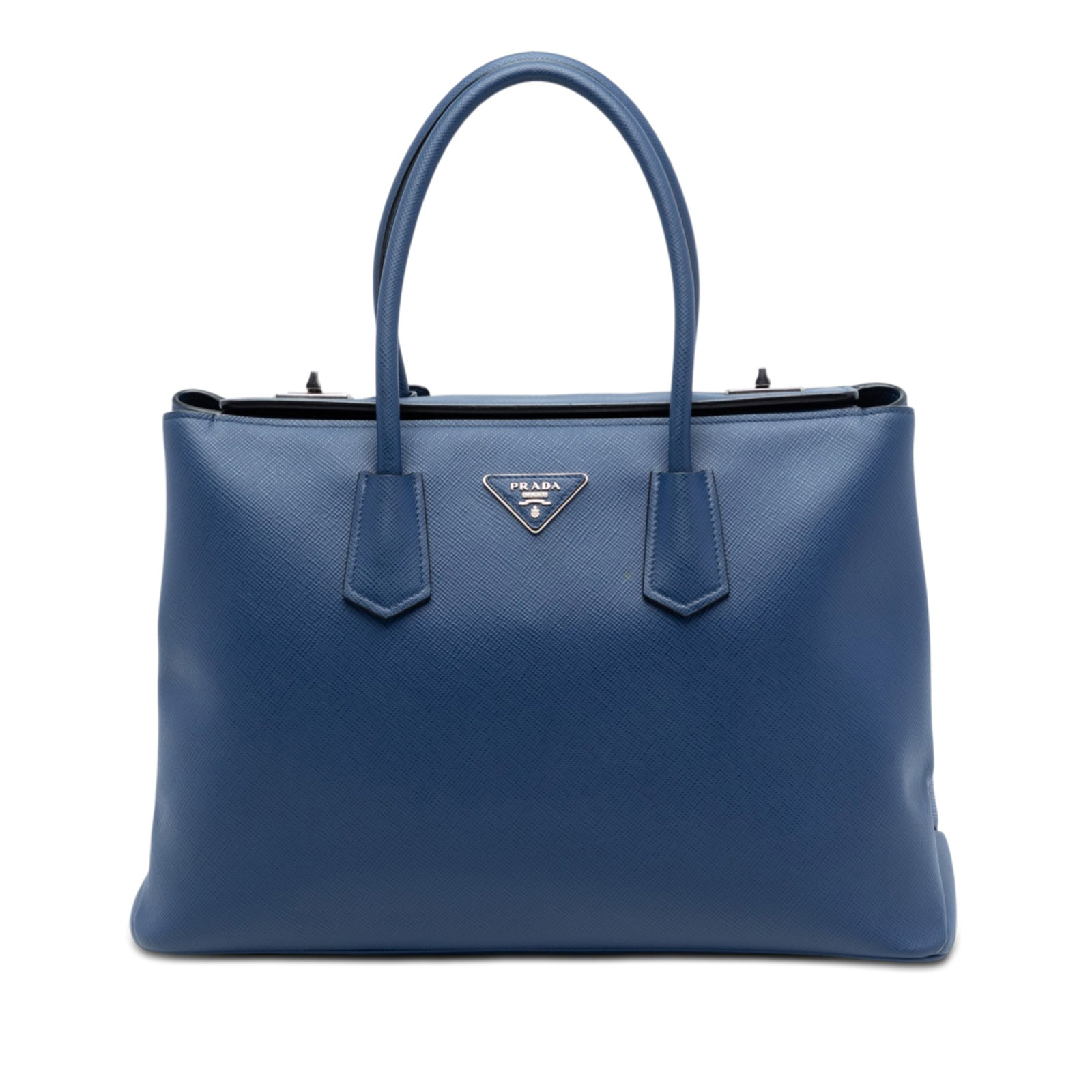 Prada blue saffiano leather turnlock satchel: Prada blue saffiano leather turnlock satchel This Prada Saffiano Cuir Turnlock Twin Satchel is crafted from blue saffiano leather and features rolled leather handles and a fold-over top with turn lock