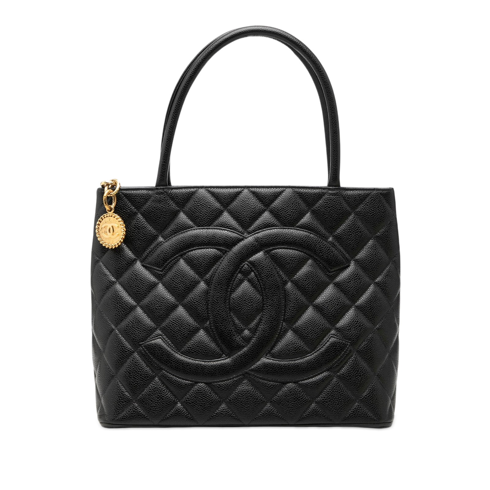 Chanel Medallion Tote Black Caviar Leather Handbag: Chanel Medallion Tote Black Caviar Leather Handbag Chanel Medallion tote crafted in quilted black caviar leather with rolled leather handles and a top zip closure. The bag includes an exterior back sl