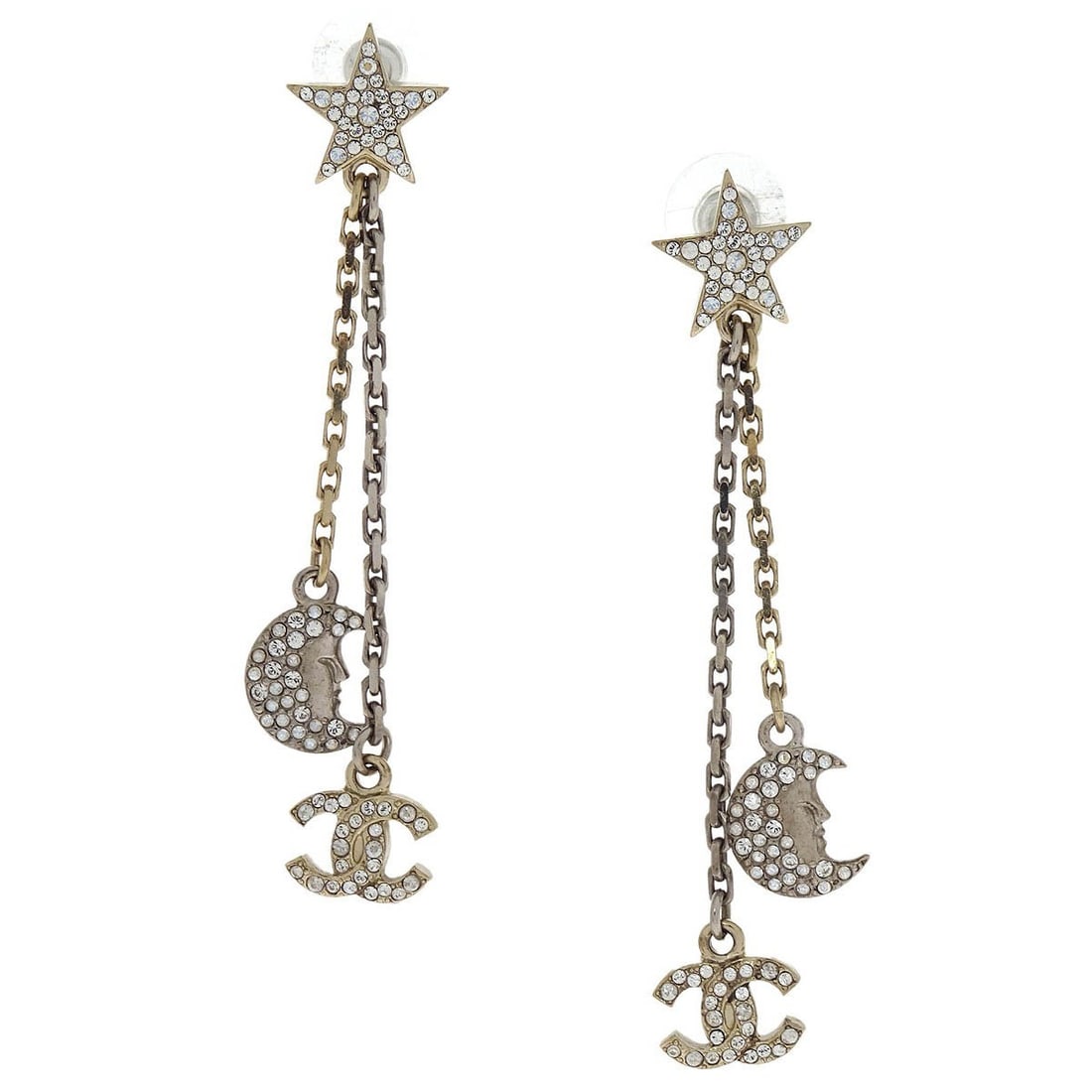 CHANEL 17B Silver Plated CC Star Moon Rhinestone Drop Earrings: CHANEL 17B Silver Plated CC Star Moon Rhinestone Drop Earrings Chanel dangle pierced earrings featuring the Star CC Moon design in silver plated metal with rhinestone accents. Made in France, this pai
