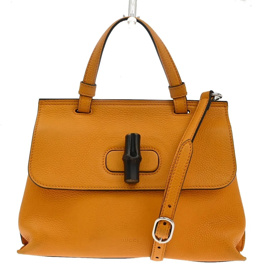 Gucci Leather Bamboo Daily Orange Top Handle Bag: Gucci Leather Bamboo Daily Orange Top Handle Bag This Gucci Bamboo Daily Top Handle Bag for women features vibrant orange leather with a structured silhouette. Made in Italy, it offers a spacious inte