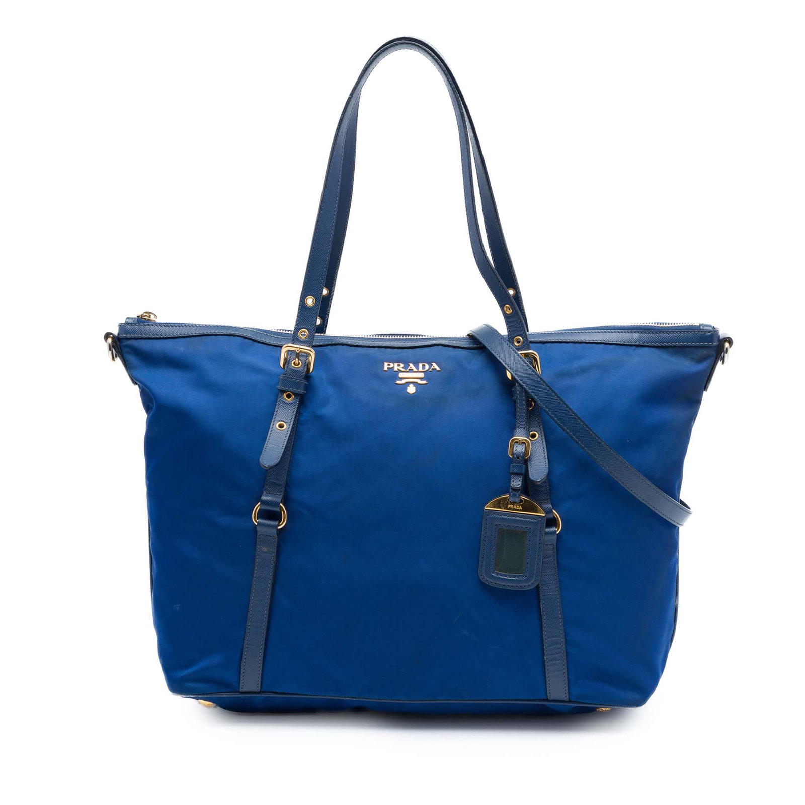 Prada Tessuto Convertible Tote Blue Nylon Saffiano Leather Trim: Prada Tessuto Convertible Tote Blue Nylon Saffiano Leather Trim Convertible tote satchel with a nylon body and saffiano leather trim. It features adjustable flat leather handles, a detachable and adju