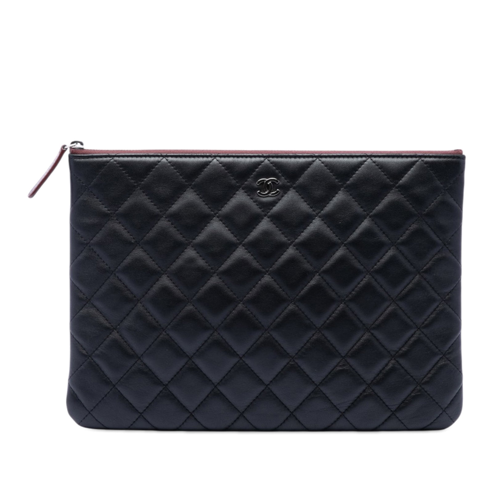 Chanel O Case Medium Clutch in Black Quilted Lambskin: Chanel O Case Medium Clutch in Black Quilted Lambskin A Chanel Medium Quilted Lambskin O Case Clutch in black, featuring a quilted lambskin leather body and a top zip closure. Made in Italy, this clut