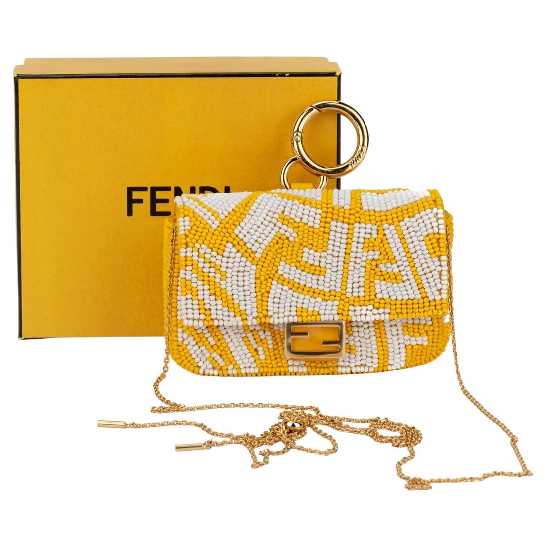 Fendi White Yellow Nano Baguette with Gold Tone Hardware: Fendi White Yellow Nano Baguette with Gold Tone Hardware Introducing the Fendi New White Yellow Nano Baguette, a chic accessory perfect for any fashion-forward individual. This stylish bag features a 