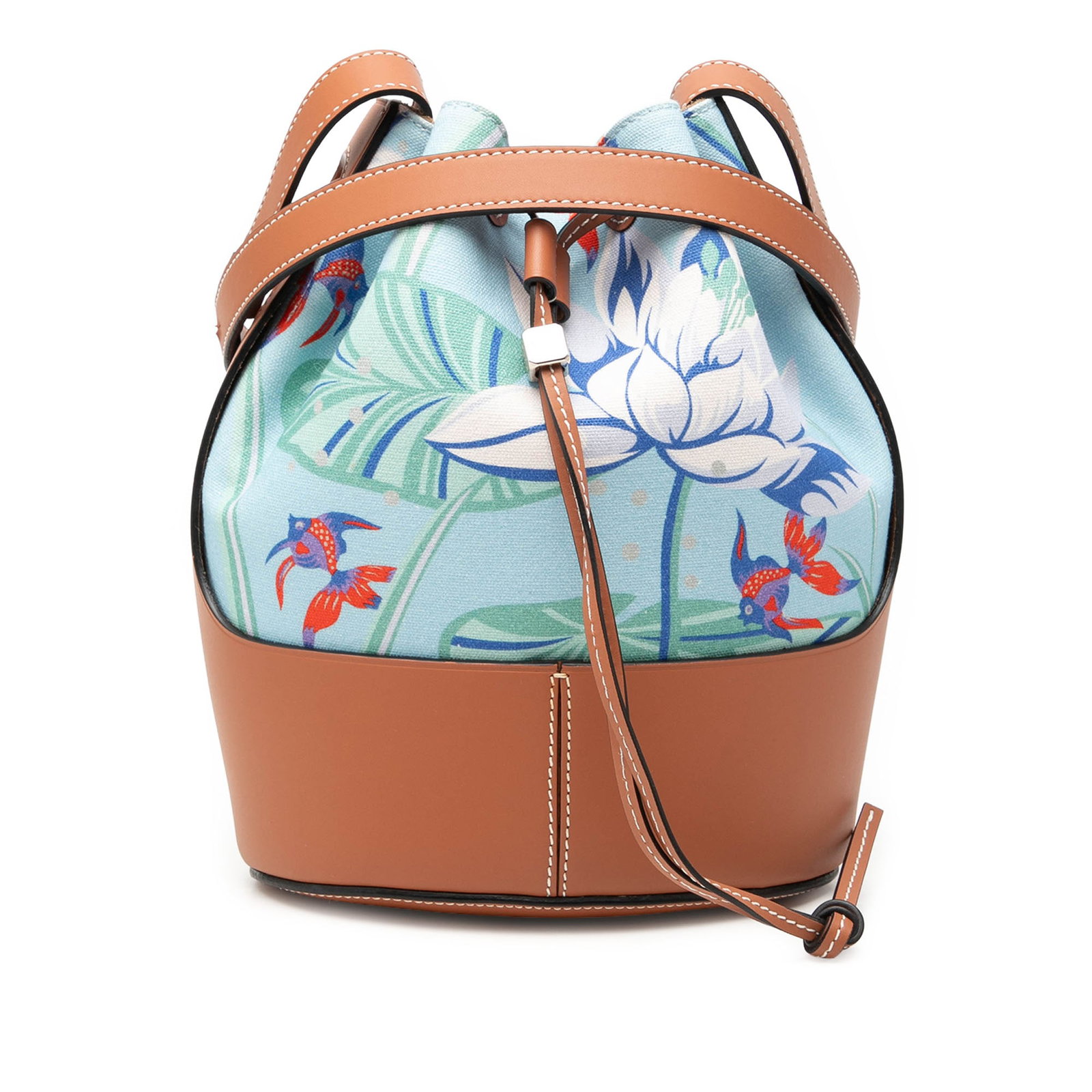 LOEWE Ibiza canvas bucket bag with leather trim: LOEWE Ibiza canvas bucket bag with leather trim This LOEWE Paulas Ibiza Small Canvas Balloon Bucket Bag features a printed canvas body with leather trim, a flat leather strap, an open top with a draws