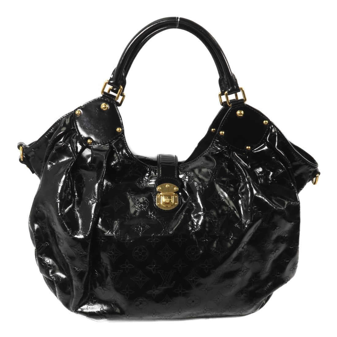 Louis Vuitton Surya L M95881 Black Mahina Patent Leather Handbag: Louis Vuitton Surya L M95881 Black Mahina Patent Leather Handbag Louis Vuitton Surya L handbag in black, made from Mahina and patent leather. It features a flap closure, one inside zip pocket, and com