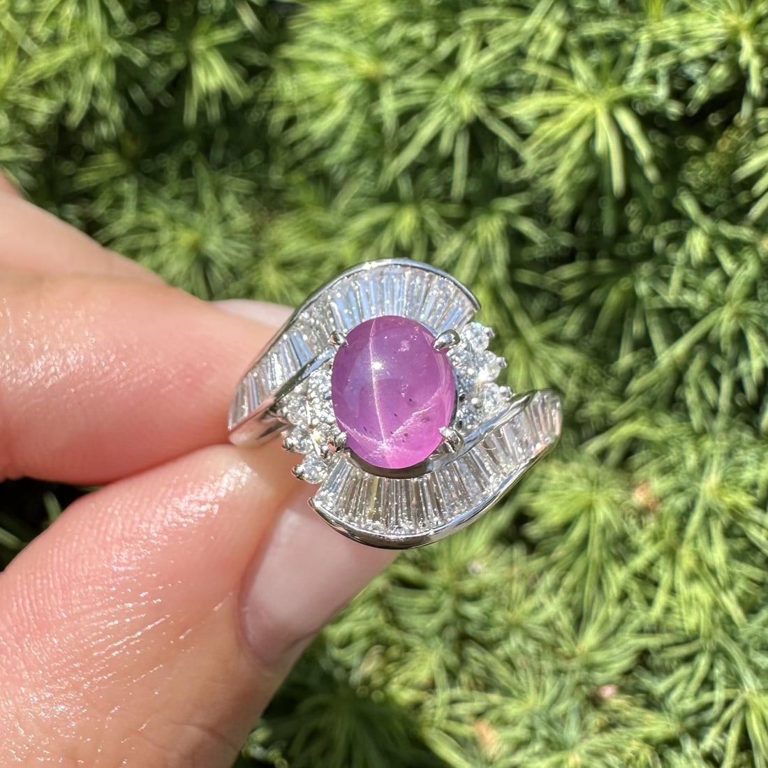 Platinum star ruby diamond cocktail ring size 5.5: Platinum star ruby diamond cocktail ring size 5.5 This vintage cocktail ring features a striking natural star ruby with a vivid purplish red hue and a strong star effect, cut in an oval cabochon and s