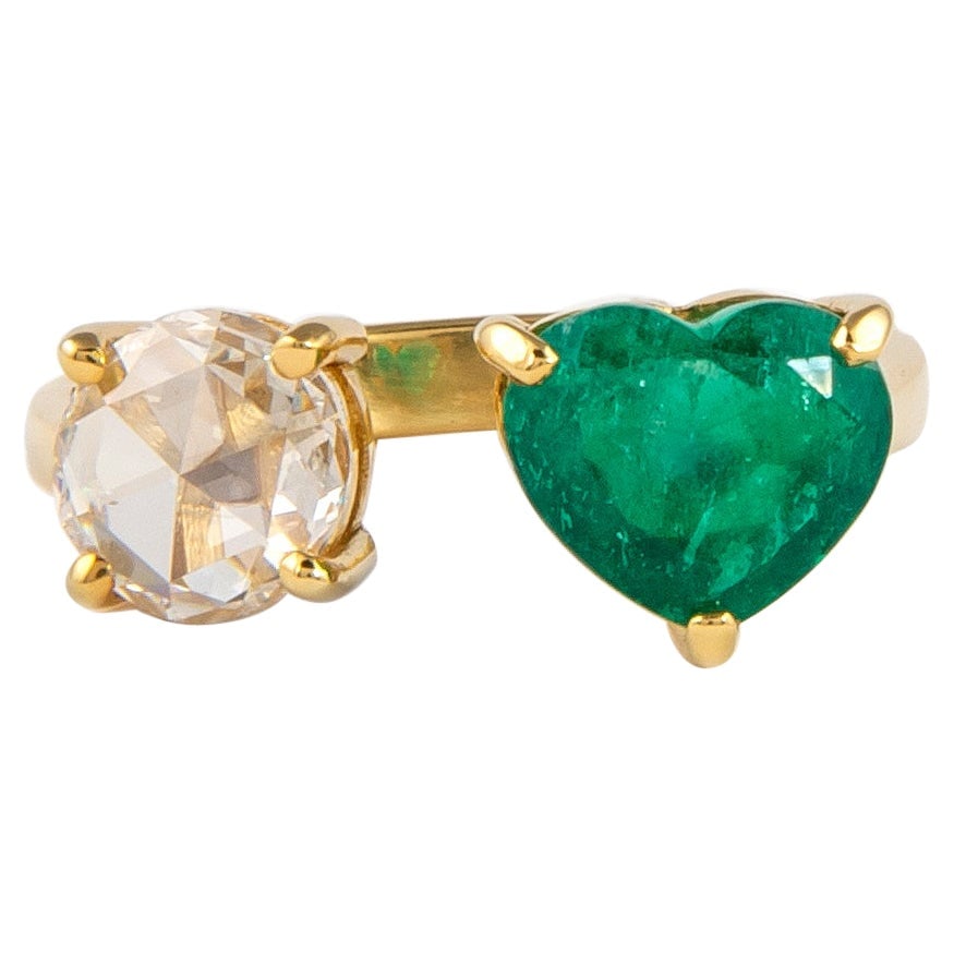 2.97ct Emerald Rose Cut Diamond Ring 18k Gold: 2.97ct Emerald Rose Cut Diamond Ring 18k Gold This exquisite Toi Et Moi ring features a stunning combination of a heart-shaped emerald and a round rose cut diamond, set in 18k yellow gold. The ring sh