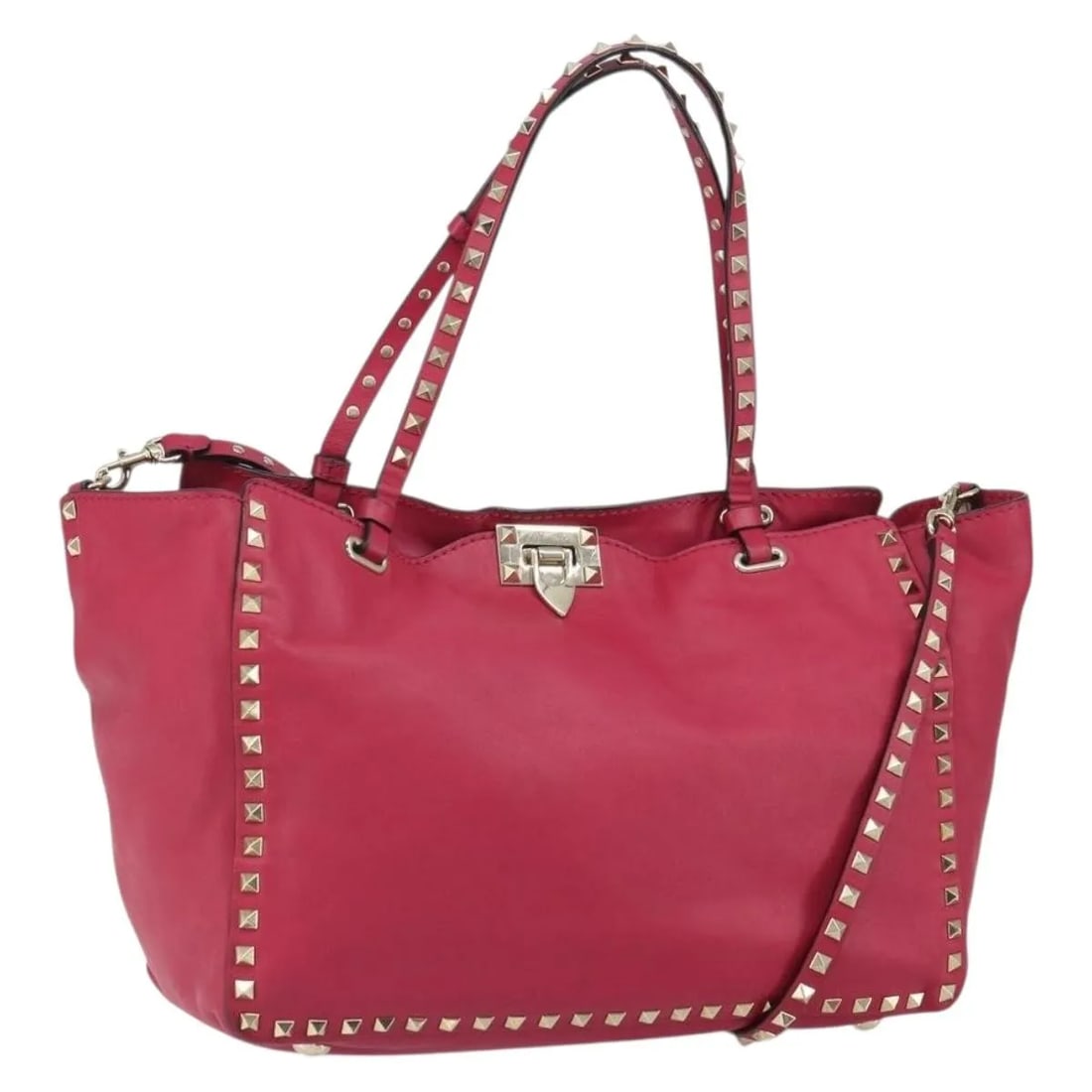 Pink Leather Rockstud Tote Bag by Valentino Garavani: Pink Leather Rockstud Tote Bag by Valentino Garavani This Valentino Garavani Rockstud Tote is crafted from soft pink leather and features iconic Rockstud detailing. Designed for women, the tote offers