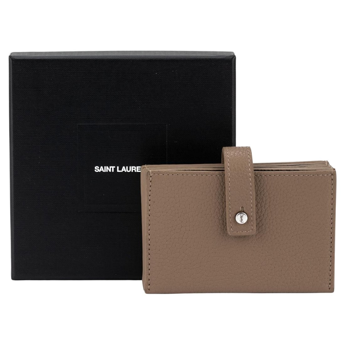 Yves Saint Laurent Camel Pebbled Leather Credit Card Wallet with Silver Logo: Yves Saint Laurent Camel Pebbled Leather Credit Card Wallet with Silver Logo Introducing the Yves Saint Laurent Camel Credit Card Wallet, a stylish and functional accessory for everyday use. Crafted f