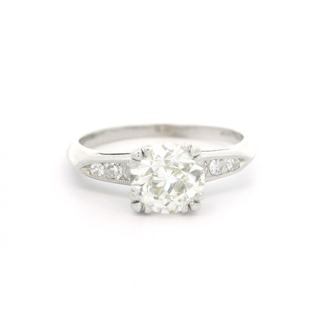 GIA Certified Antique Platinum Palladium Ring With 1.53ctw Old European Diamonds: GIA Certified Antique Platinum Palladium Ring With 1.53ctw Old European Diamonds This antique engagement ring features a certified 1.39ct Old European cut natural diamond (K color, VS1 clarity) as its