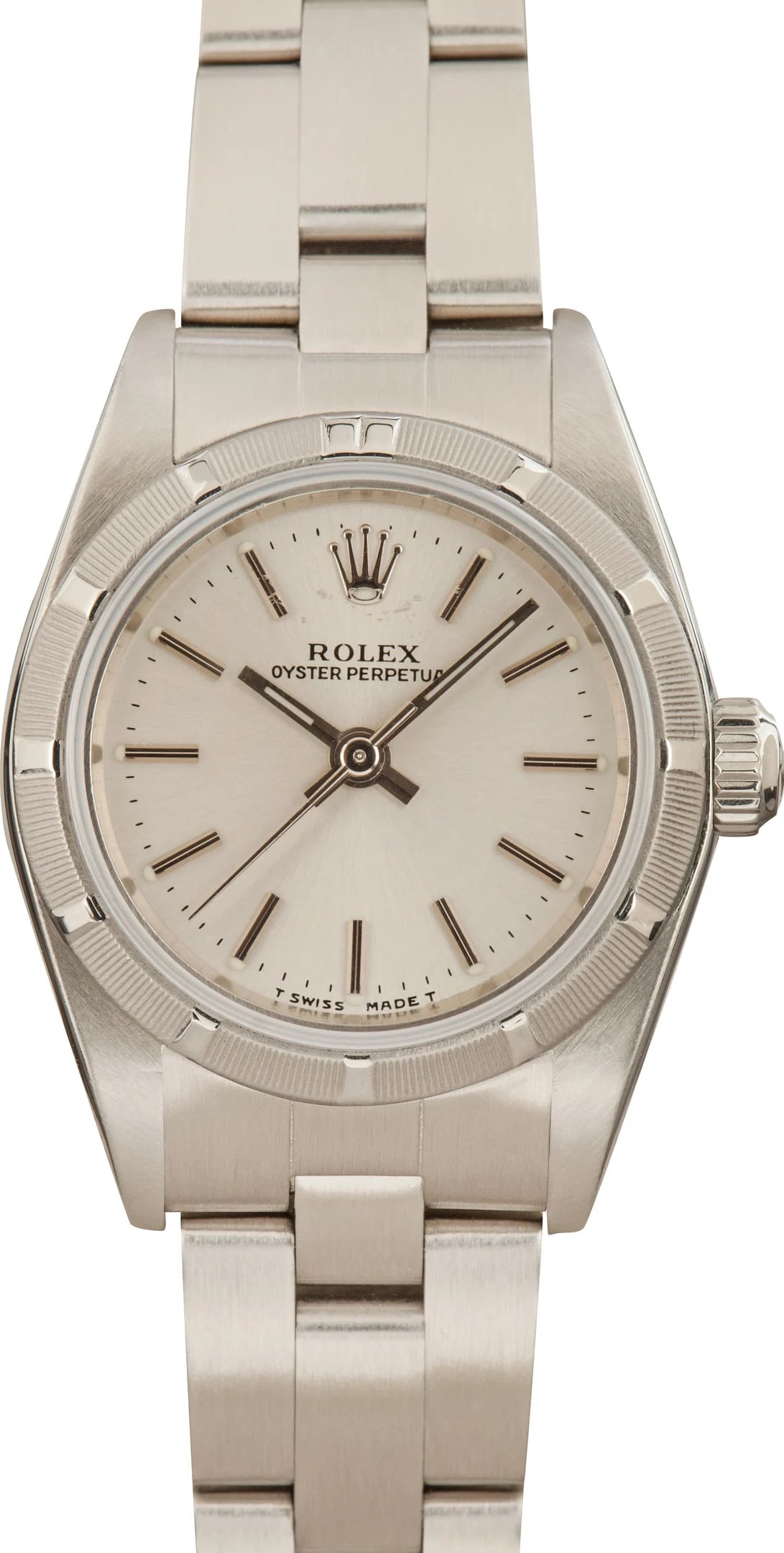 Ladies Rolex Oyster Perpetual Ref 76030 Silver Dial with Papers 2000: Ladies Rolex Oyster Perpetual Ref 76030 Silver Dial with Papers 2000 This Rolex Oyster Perpetual features a silver dial and an Oyster bracelet, crafted for ladies. The watch has an engine-turned bezel