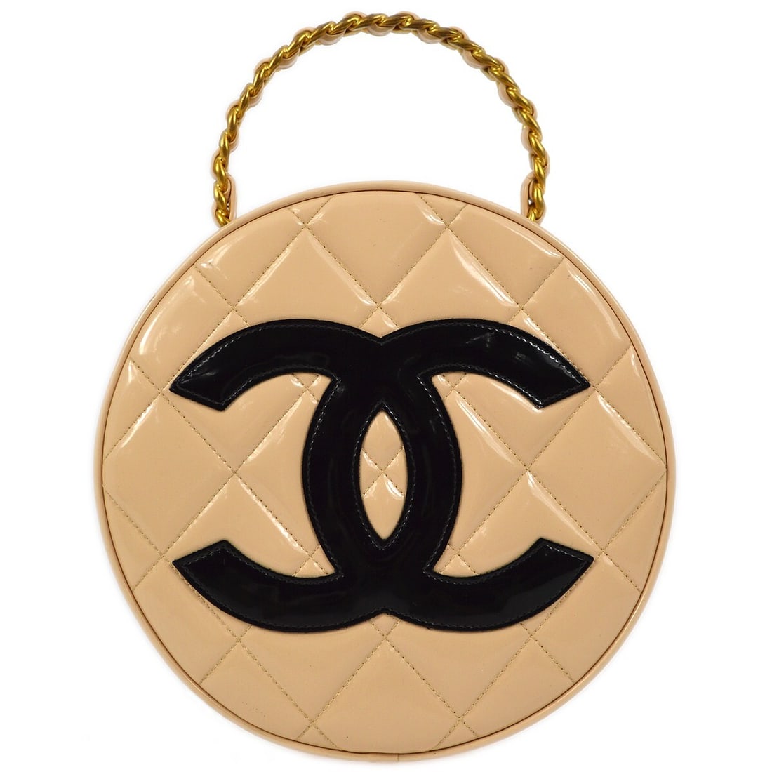 CHANEL Quilted Round Vanity Bag in Beige Patent Leather: CHANEL Quilted Round Vanity Bag in Beige Patent Leather Chanel round vanity handbag in beige patent leather with a zip closure and top handle. The bag features the Chanel Quilted line styling and incl