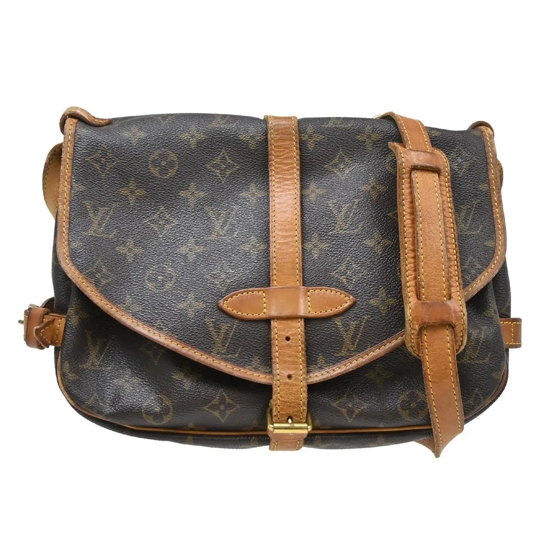 Louis Vuitton Saumur shoulder bag in brown monogram canvas: Louis Vuitton Saumur shoulder bag in brown monogram canvas Louis Vuitton Saumur in brown monogram canvas. This unisex bag is in good condition with visible wear, including scuffs, cracks, sun tanning,