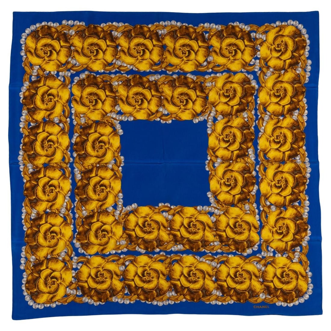 Chanel Camellias Vintage Silk Scarf Blue Gold 34 in: Chanel Camellias Vintage Silk Scarf Blue Gold 34 in Vintage Chanel "Camellias" scarf featuring a blue floral print with gold camellias. Made in Italy from 100% silk, this 20th century piece is present