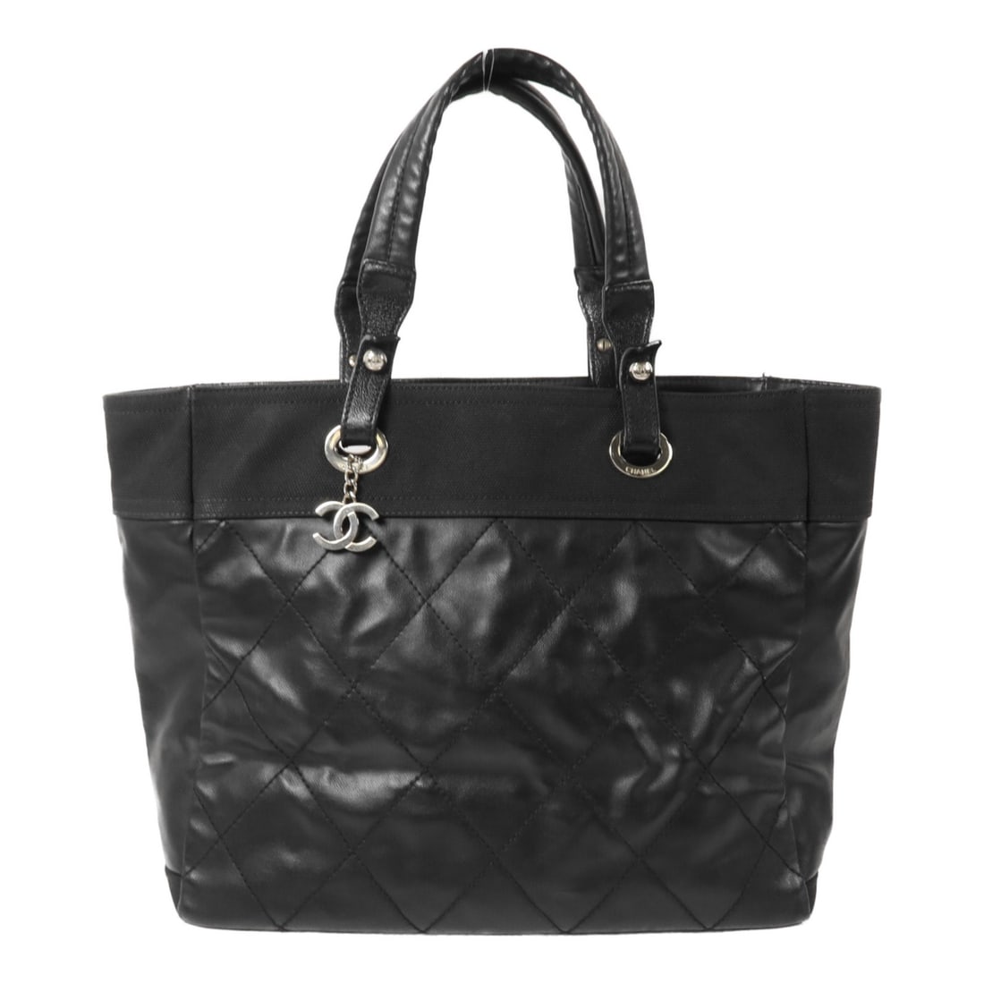 Chanel Paris Biarritz Black Tote Bag Calfskin Coated Canvas CC SHW: Chanel Paris Biarritz Black Tote Bag Calfskin Coated Canvas CC SHW CHANEL Paris Biarritz tote bag in black calfskin leather and PVC coated canvas. Made in France, this regular-size women's tote featur