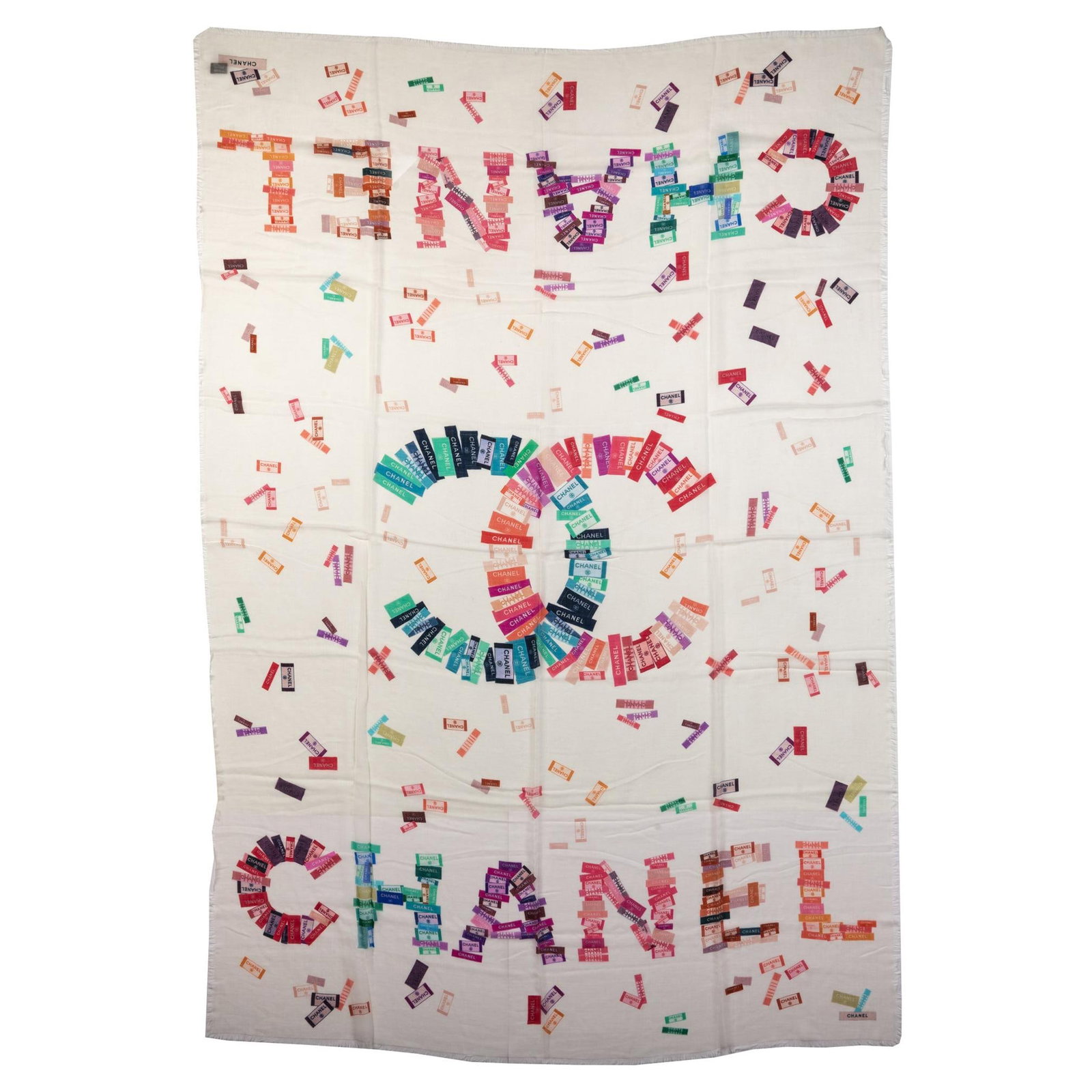 Chanel Cashmere Silk Multicolor Logo Shawl 54x75 Italy: Chanel Cashmere Silk Multicolor Logo Shawl 54x75 Italy Experience luxury with this exquisite Chanel shawl, crafted from a blend of cashmere and silk. The shawl showcases a stunning off-white base ador