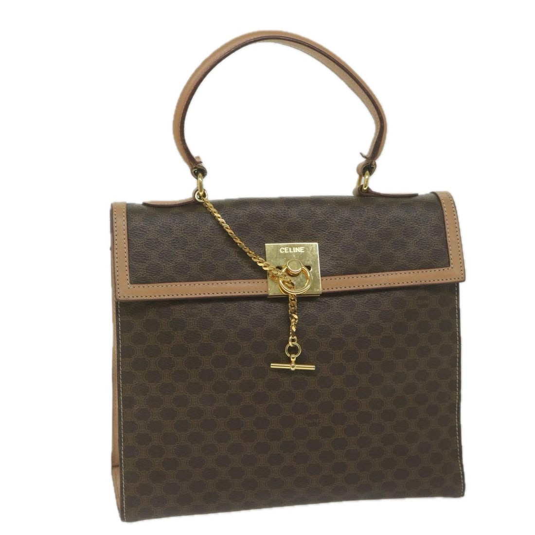 CELINE Macadam Brown PVC Leather Handbag Made in Italy: CELINE Macadam Brown PVC Leather Handbag Made in Italy This CELINE hand bag is crafted from PVC leather and Macadam canvas in brown. Made in Italy, it features a structured size of approximately 27 cm